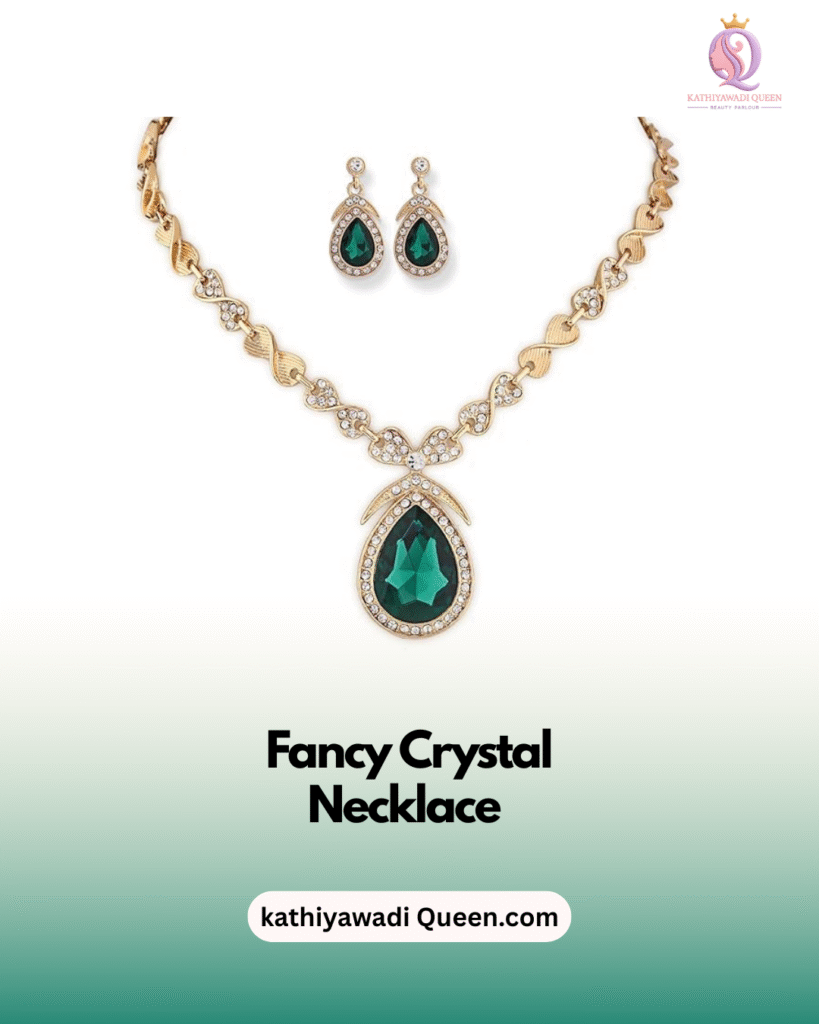 Fancy crystal necklace with green teardrop pendant and matching earrings from kathiyawadi Queen