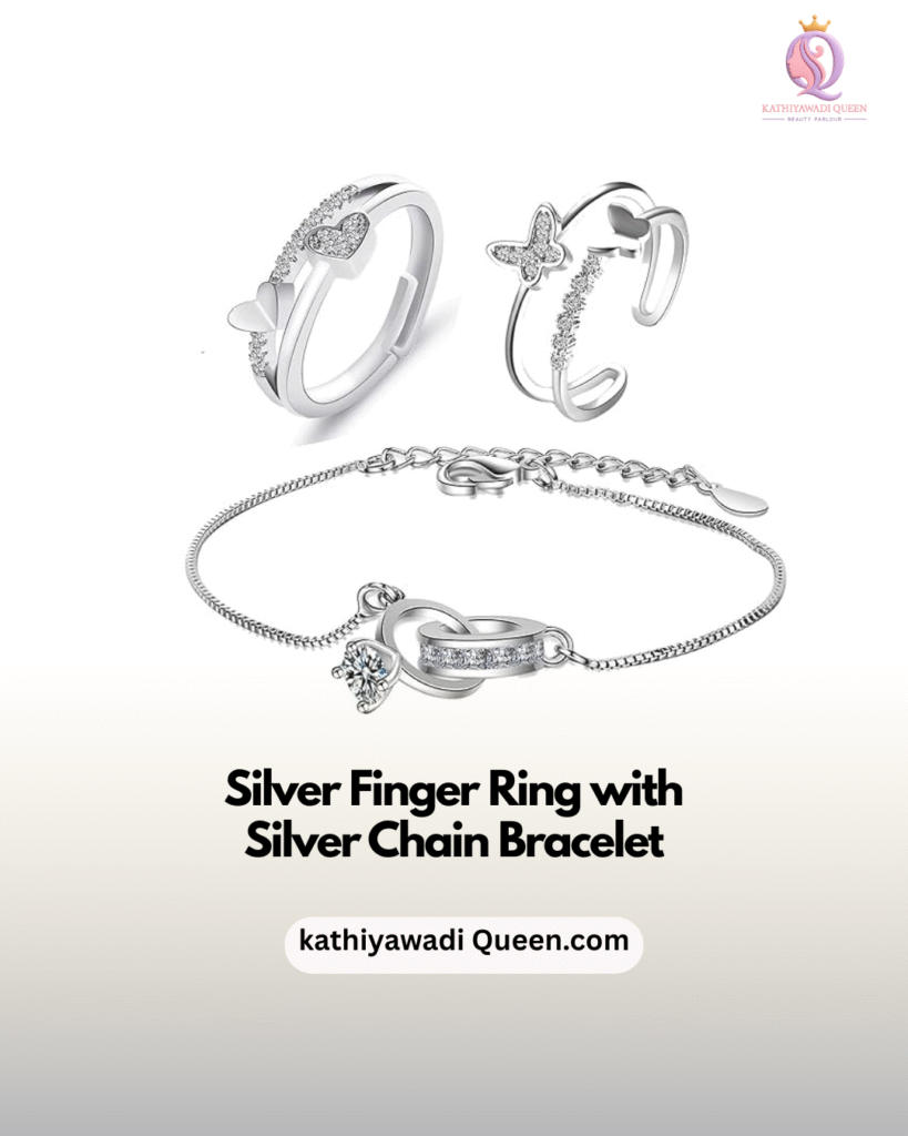 Silver finger ring with butterfly and heart design paired with silver chain bracelet from kathiyawadi Queen